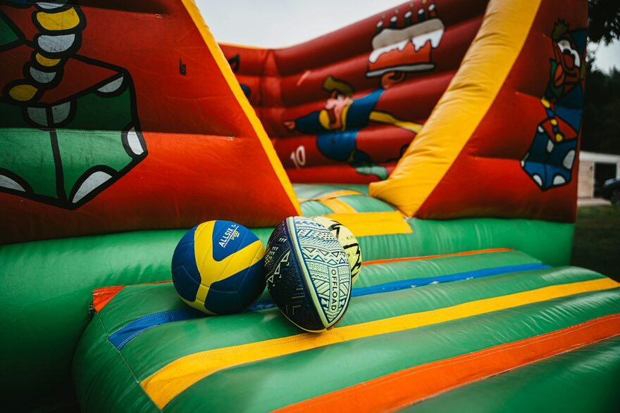 An inflatable game arena with giant play balls